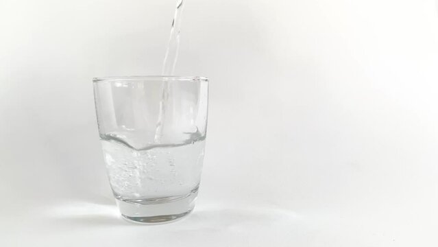 Pour water into a glass to feel refreshed.