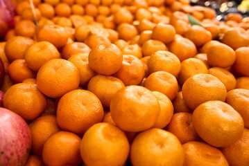 Tangerine background. Fresh mandarin on farmers market.
