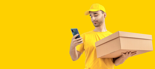 Delivery man with a box, smartphone. Courier in uniform cap and t-shirt service fast delivering orders. Young guy holding a cardboard package. Character on isolated background for mockup