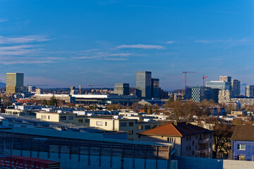 Obraz premium Modern skyline of City of Zürich North with skyscrapers and cranes on a sunny winter day. Photo taken January 7th, 2023, Zurich, Switzerland.