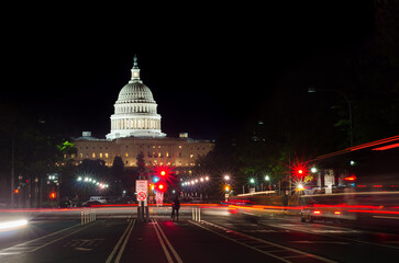 US Capitol building and car light trails at night - Washington DC, United States