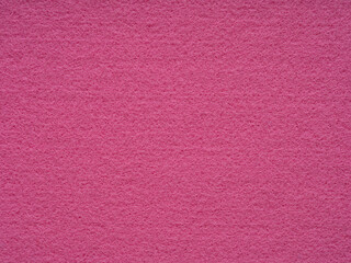 Texture of crimdon, purple, pink felt close-up. Handicraft concept, crafts, DIY, do it yourself. Top view, flat lay, layout, place for text. For shops with goods for creativity patchwork or art work.