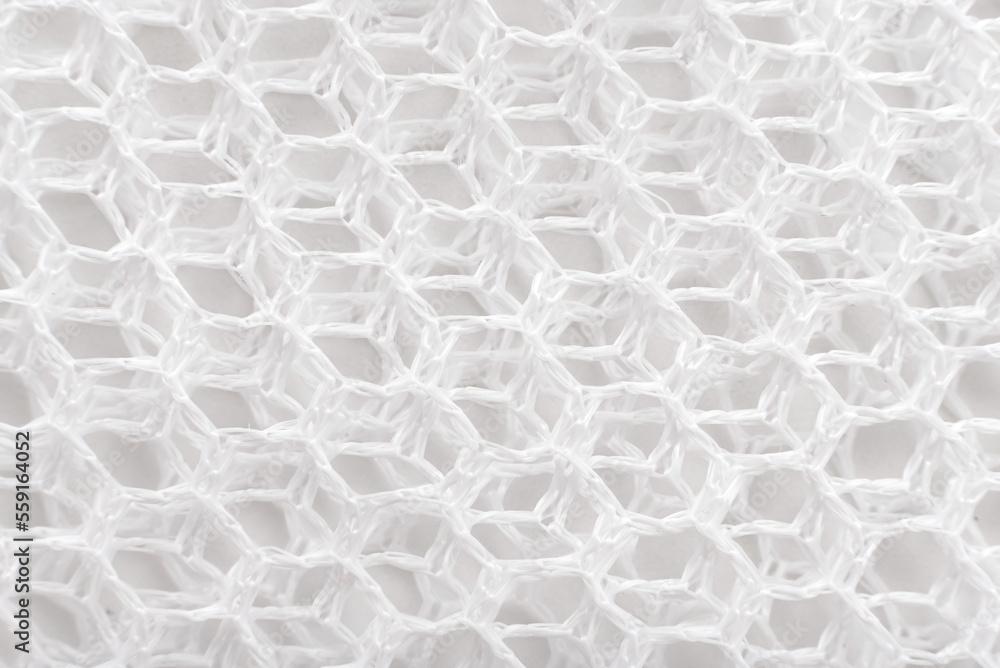 Wall mural texture or background of mesh fabric in white. mesh material