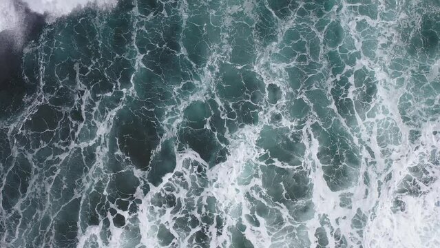 Amazing 4K aerial footage off the coast of Madeira from the Atlantic Ocean taken with a drone from a bird's eye view. Big waves.
