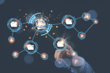 Fototapeta premium Document Management System. Hand of a man touching file documents icon virtual screen management document for protection database of the company. DMS, technology, security of documents concept.