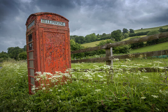 Red telephone boot at the counntryside. Meadows and hills. Monmouthshire, Skenfrith, UK, wales,