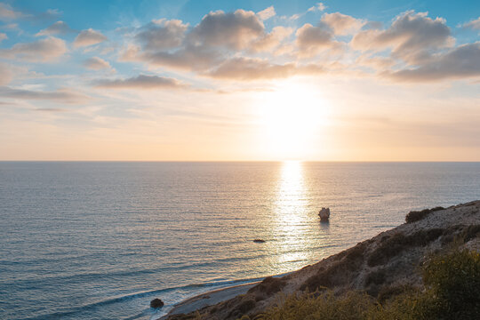 Natural landscape of beautiful sunset over Mediterranean sea in Cyprus near Aphrodite rock.