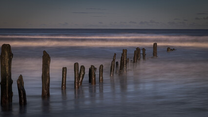 Groynes on the beach at Sandsend in North Yorkshire