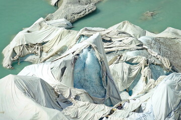 The melting of the Rhone Glacier is the most visible sign of climate change. Due to high...