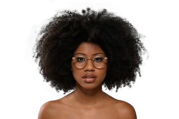 black woman wearing gold-framed glasses looking at the camera