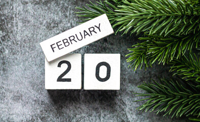 February 20 presidents day on vintage calendar on stone table