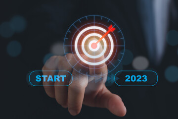 Man finger touching dart board arrow icon with target for success, Effective business concept...