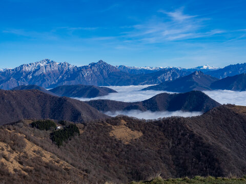 Clouds on the valley floor of Lake Como and Brianza viewed from Mount Puscio