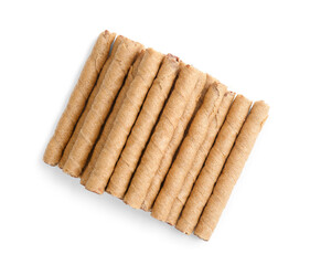 Heap of tasty wafer rolls isolated on white background
