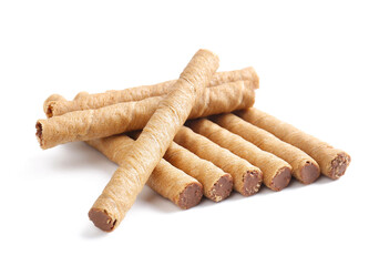 Tasty wafer rolls with boiled condensed milk isolated on white background