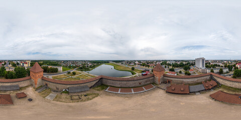 aerial full seamless spherical hdri 360 panorama view above over a medieval castle  and historic buildings in equirectangular projection.