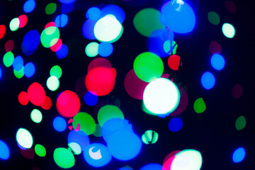 Beautiful blue night bokeh light, abstract blur defocused background. Colorful overlay glitter lights for layout design. Boke glows concept of Celebration, Christmas or festival seasonal background.