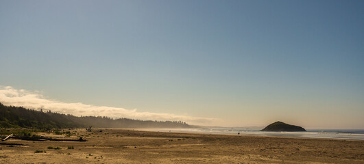 sand beach over the Pacific Ocean along the Vancouver Island coastline, British Columbia, Canada