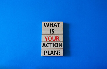 What is your action plan symbol. Wooden blocks with words What is your action plan. Beautiful blue background. Business and What is your action plan concept. Copy space