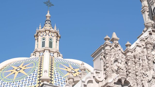 Spanish colonial revival architecture in Balboa Park, San Diego, California USA. Historic building, classic baroque or rococo romance style. Bell tower or belfry relief decor and mosaic dome or cupola