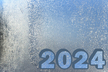 On the frozen glass, there are volumetric figures "2024" filled with a frozen texture.