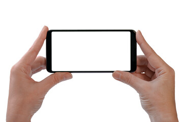 Close-up of female hands holding smartphone with blank screen on white background