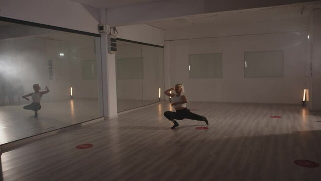 Dance artist dancing and performing contemporary dance choreography with emotion