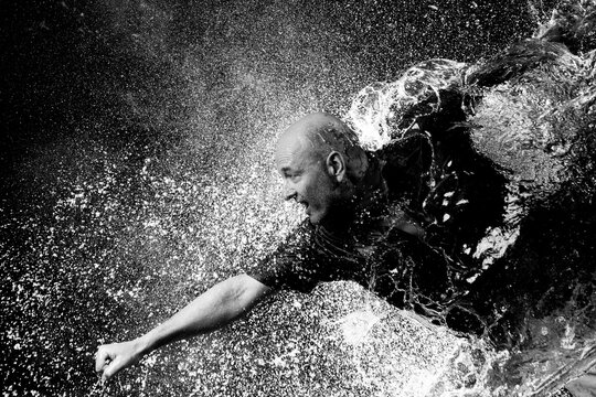 punching a water balloon
