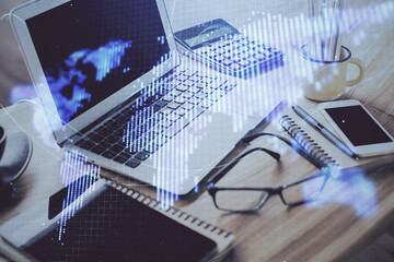 Double exposure of business theme icons and work space with computer background. Concept of success.