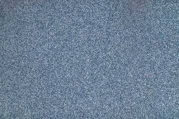 Surface puttied with decorative putty as a background. Preparation of facade walls