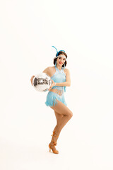A girl dancer in Gatsby-style costumes