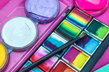 Naklejka premium Face painting. Face and body painting for children. Color palette.