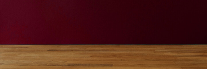 Panorama of dark red background for copy space and wooden table. Minimal design template. Real photo.