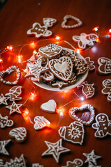 gingerbread cookies on the table with lights