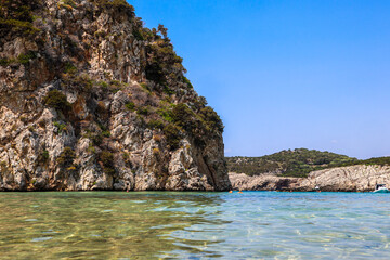 Relaxing summer day in Voidokilia Beach, Greece