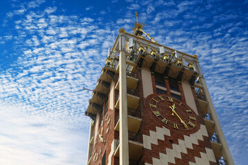 selective focus: Piazza clock tower with its magnificent engraving in Piazza square, a tourist...