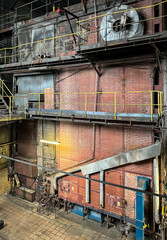 Grate-fired coal boiler producing steam made in the old technology of heavy walls