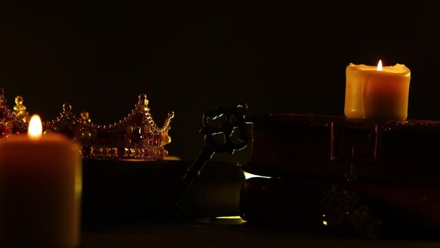 Mysterious crown, key and book on a dark background. Panoramic mockup for your logo. Horizontal banner with copy space for popular social media website cover image.