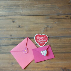 Dark Pink and Light Pink Envelopes with Happy Valentine Day Heart on Wood Panels