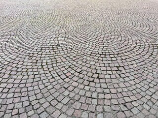 paving stone texture. Abstract background of old cobblestone floor.