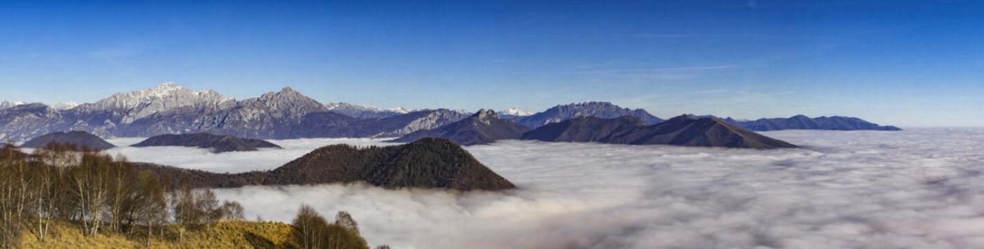 Clouds on the valley floor of Lake Como and Brianza viewed from Mount Puscio