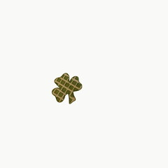 Green and Tan Plaid Shamrock on White Background with Room for Text