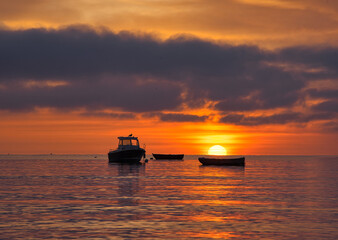 Obraz premium Sunrise sunset on the sea beach.