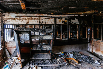 Burned interiors of hospital. Fire or war consequences concept
