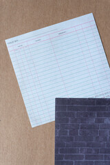 scrapbook paper sheets with pattern: card with lines and text and brick wall