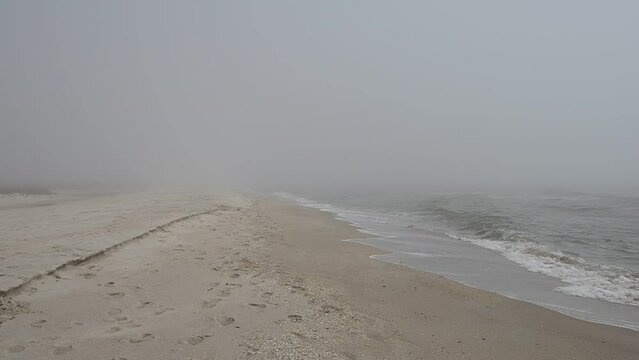 The sea beach in fog. Shooting on the beach.