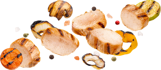 Grilled chicken slices and chopped vegetables isolated