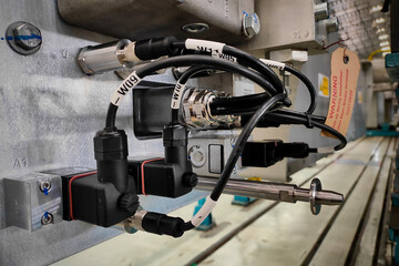 Electrical equipments components with cables valves energy power to machines in industry appliances