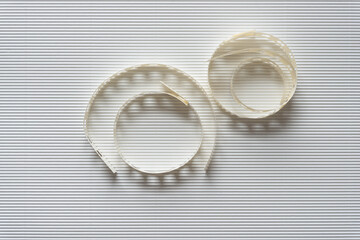 paper coils on corrugated texture
