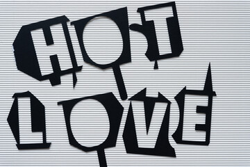 "hot love" on corrugated cardboard texture